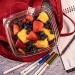 32 oz RPET Plastic Tamper-Evident/Resistant Container with Flat Lid with mixed fruit inside