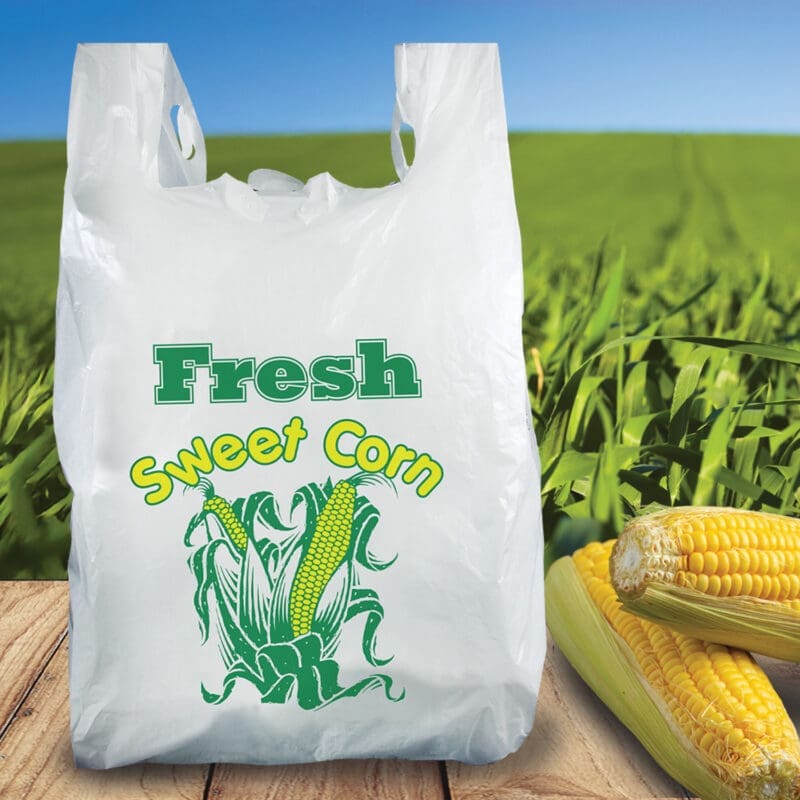 100916 Fresh Sweet Corn Bag sitting on Table Fresh Sweet Corn Bag sitting on Table