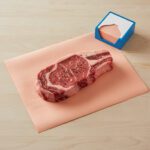 Peach Steak Paper 8" x 30" shown with steak on sheet