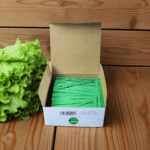 green twist ties on table