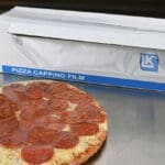 24 X 23 0.6 mil Pizza Capping Film with pizza wrapped