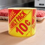 promotional Family Pack 10 cents off per pound butcher sticker with save on a yellow and red label