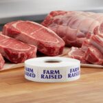 farm raised label on a white sticker with blue print