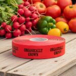 organically grown red sticker on a roll of labels