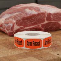 arm roast label on a small red label with black text reading arm roast