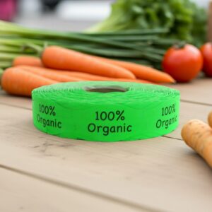 100% organic green sticker on a roll of labels