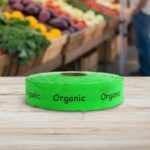 organic green sticker on a roll of labels