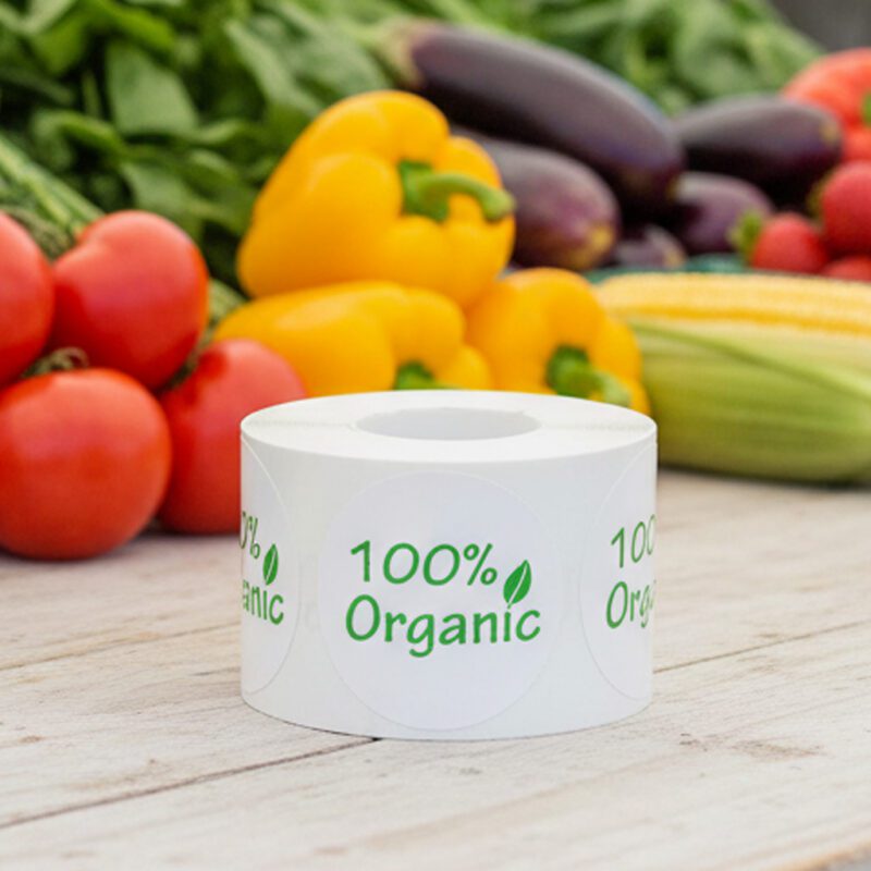 590052-100%-Organic-White-and-Green-Label-Stickers 100% organic label on a round white sticker with green print and a leaf above the I