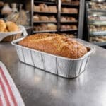 Loaf pan with bread inside