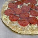 Pizza Capping Film showing pizza wrapped