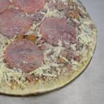 Pizza Capping Film showing thin crust pizza wrapped
