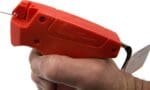 Swiftach Mark III Fine Fabric Pistol Grip Tagging Tool being held