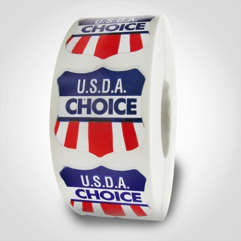 USDA Choice label on roll of stickers with red, white and blue design USDA Choice label on roll of stickers with red, white and blue design