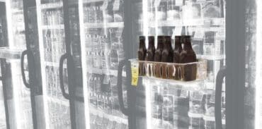 Freezer door merchandiser in use