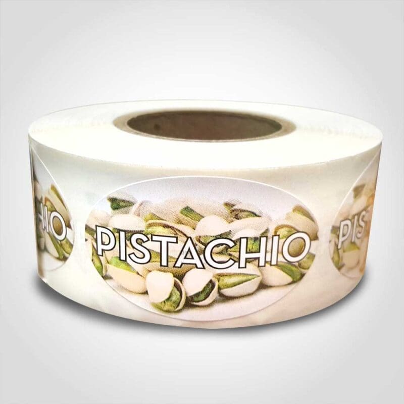 Pistachio Label Flavor Oval Sticker with a slice of Pistachios pictured in the background with the word Pistachio printed on top on roll of 500 stickers