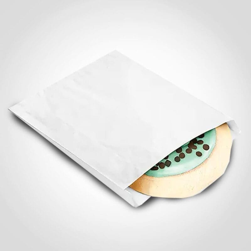 White Grease-Resistant Pastry Bag shown with cookie inside package