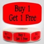 Buy 1 Get 1 Free Label Dayglo Sticker on a roll of 1000 labels, reads Buy 1 get 1 free