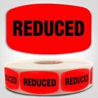 Reduced Label Dayglo Sticker on a roll of 1000 labels, read reduced in black on red sticker