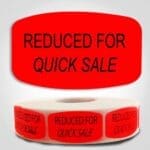 Reduced for Quick Sale Label Dayglo Sticker on a roll of 1000 labels, reads Reduced for Quick Sale in Black on Red Sticker