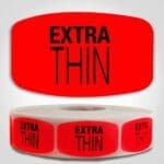 Extra Thin Label Red Dayglo Sticker on a roll of 1000 labels, reads Extra Thin in black print on red label