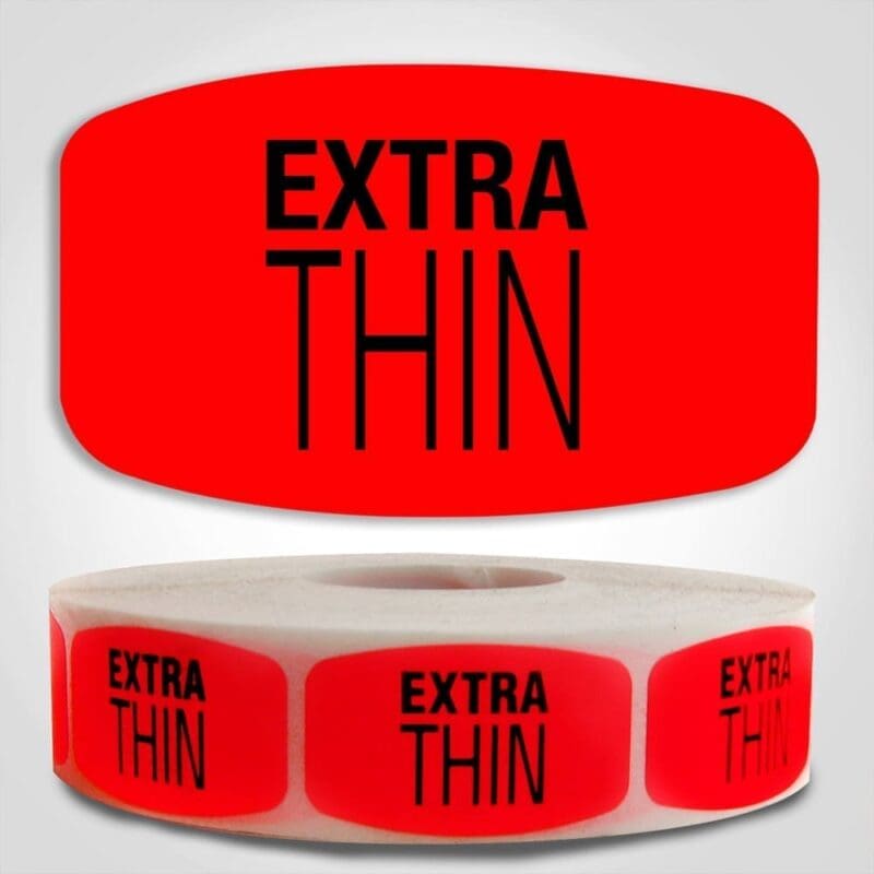 Extra Thin Label Red Dayglo Sticker on a roll of 1000 labels, reads Extra Thin in black print on red label