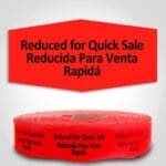Reduced for Quick Sale Spanish translation Label Red Dayglo Sticker on a roll of 1000 labels