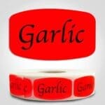 Garlic Flavor Label Red Dayglo Sticker on a roll of 1000 labels, reads garlic in black print on red label