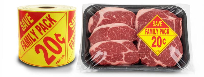 Roll of Family Pack Labels next to ground beef tray in supermarket display