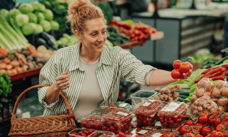 lady grocery shopping for produce