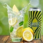 james lemonade with can and poured into glass cup