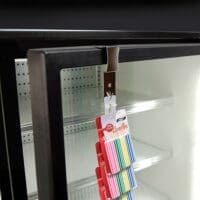 Merchandising Strip Hanger for Cooler Door