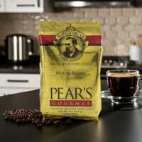 Pears Coffee House Blend 8oz sitting on kitchen counter next to a coffee