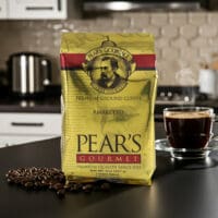 Pears Coffee Amaretto 8oz next to coffee