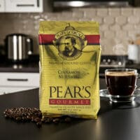 Pears Coffee Cinnamon Nut Swirl 8oz next to coffee