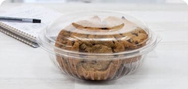 Round Clamshells container with hinged lid with cookies inside