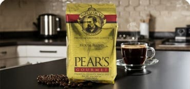 Pear's Coffee Bag shown with coffee in cup