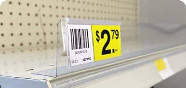 UPC Tag Holders in use on retail shelving