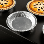 9″ x 1″ Medium Depth Foil Pie Pan on dark background