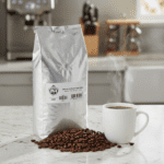 Wholesale Pears Whole Bean Coffee French Vanilla bags next to a coffee