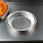 8 inch Deep Foil Pie Pan, Pie Tin on metal countertop