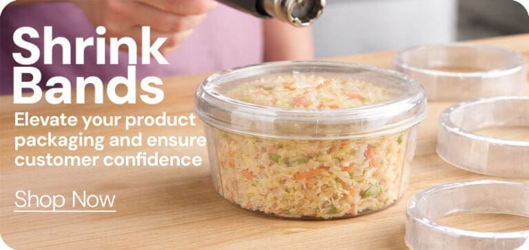 Shrink bands being heat sealed on deli counter