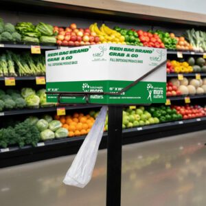 grab and go produce bag in a rack with p-life in a produce department