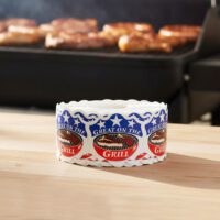 Great On The Grill BBQ Label Stickers roll of labels next to grill