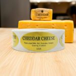 cheddar cheese label on a gold foil label