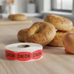 onion label on a bright red label with onion bagels in the background