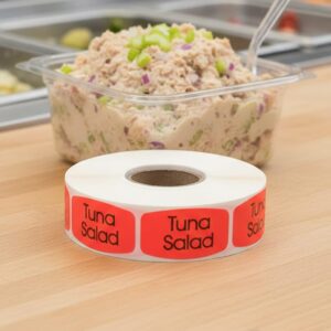 Tuna Salad sticker red identification label with black print on a roll of stickers