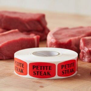 petite steak sticker on a red label with black text