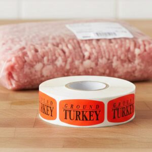 ground turkey sticker on a red label with black print