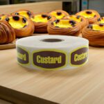 custard stickers with yellow print and brown background