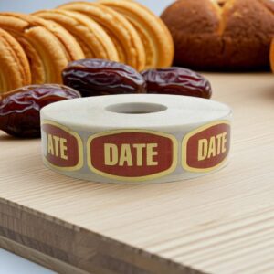date label on a gold foil stickers shown with several date fruits